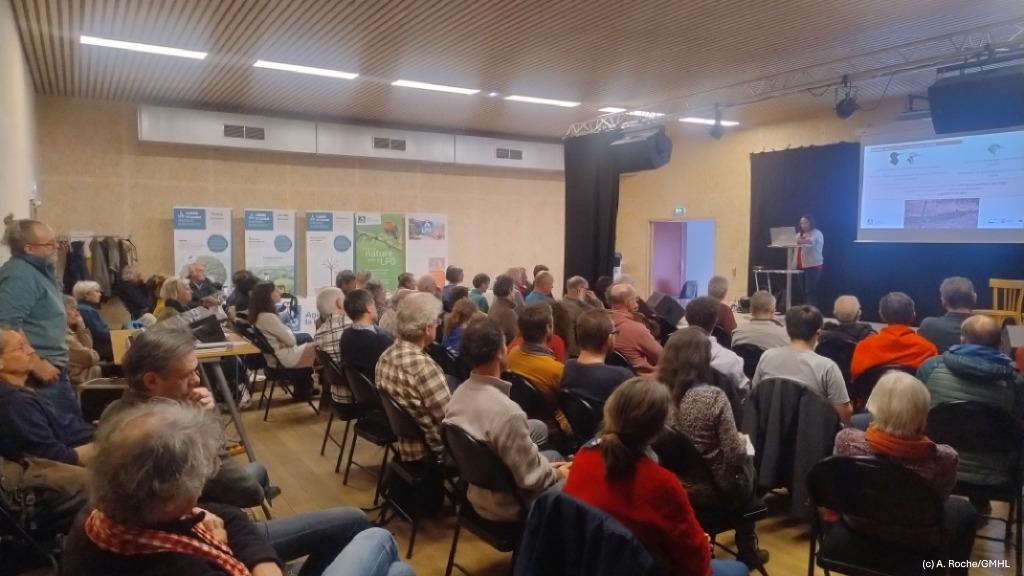 Salle remplie pour la présentation sur le suivi des pics